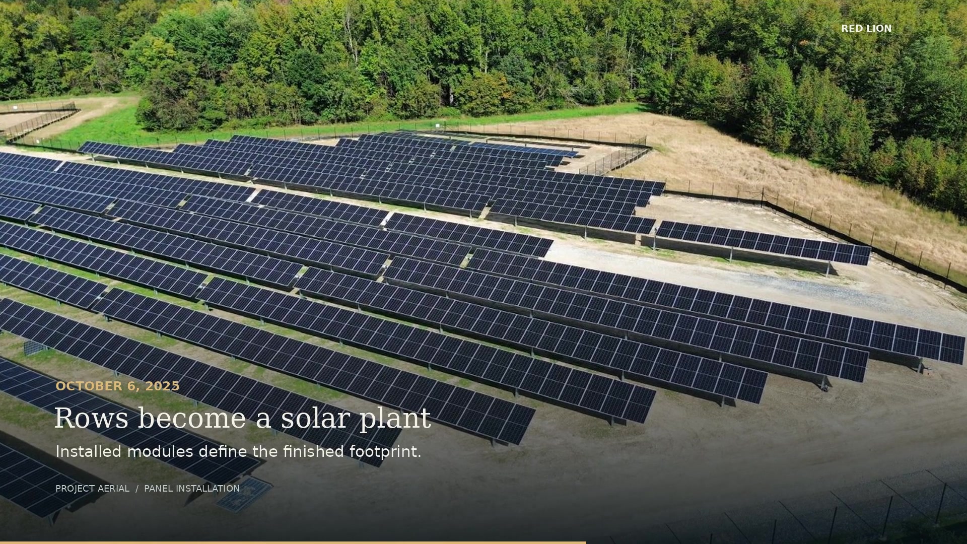 Aerial view of installed solar-panel rows at Red Lion, shown in the project film